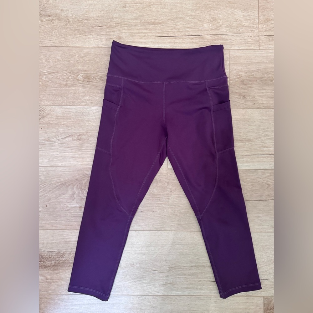 Purple Zyia workout leggings.